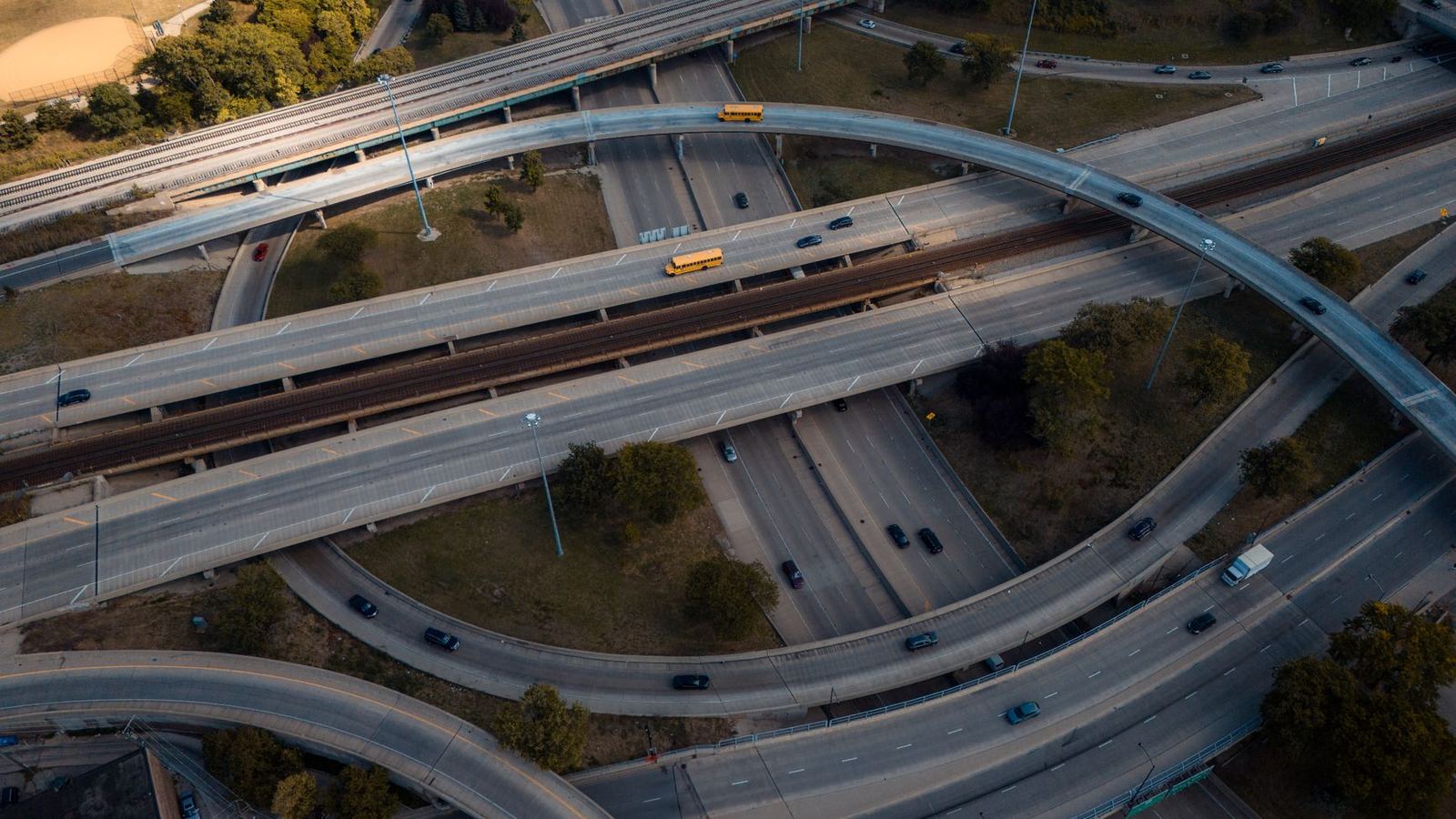 Aerial view of a highway interchange and its curving ramps