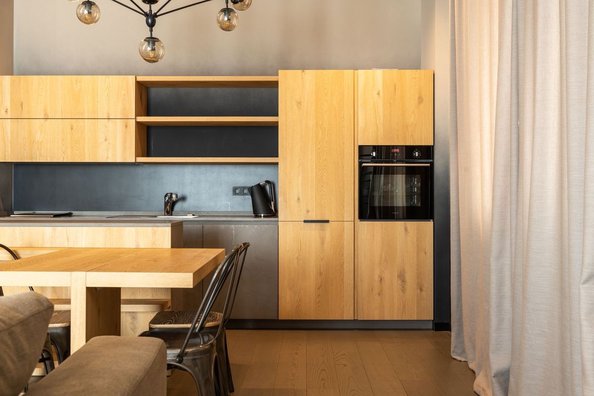 Oak apartment kitchen with a dining table